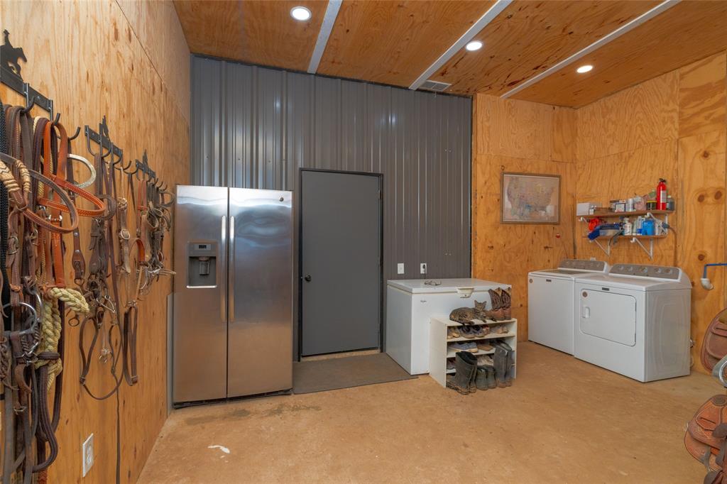 5543 Gray Road Nocona, TX 76255 - Photo 22 of 36 a kitchen with a refrigerator and sink