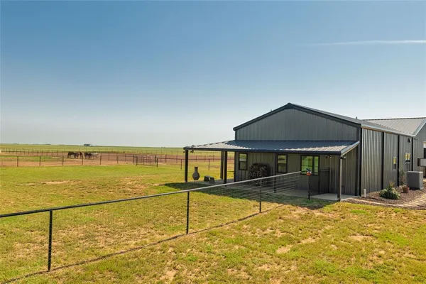 a view of a house with a ocean view