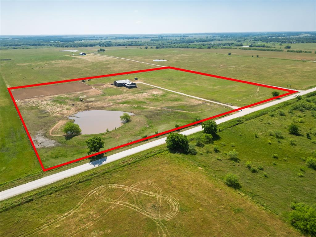 5543 Gray Road Nocona, TX 76255 - Photo 32 of 36 a view of an outdoor space and swimming pool