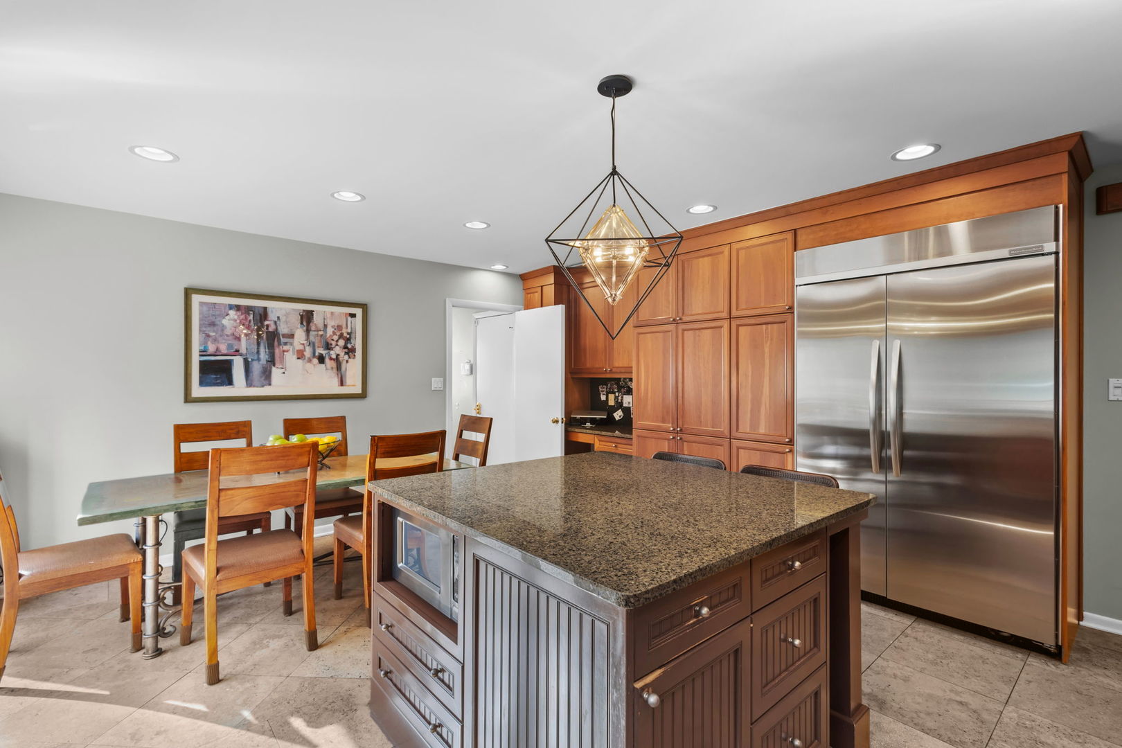 2775 Salceda Drive Northbrook, IL 60062 - Photo 13 of 37 a kitchen with a table chairs and refrigerator
