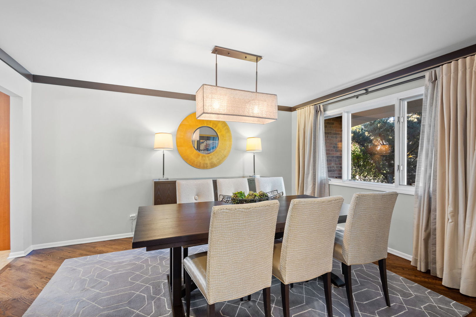 2775 Salceda Drive Northbrook, IL 60062 - Photo 8 of 37 a view of a dining room and a table and chairs