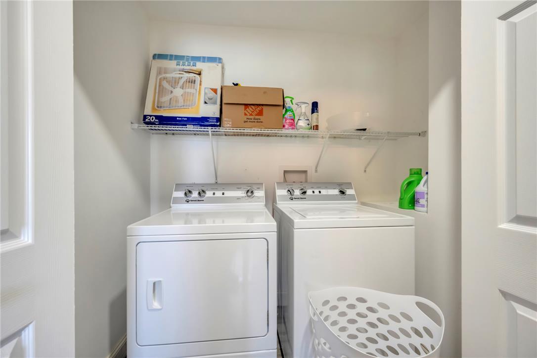 439 Cherry Hill Road Nazareth, PA 18064 - Photo 26 of 31 A well-appointed laundry area features a washer and dryer, providing essential convenience.