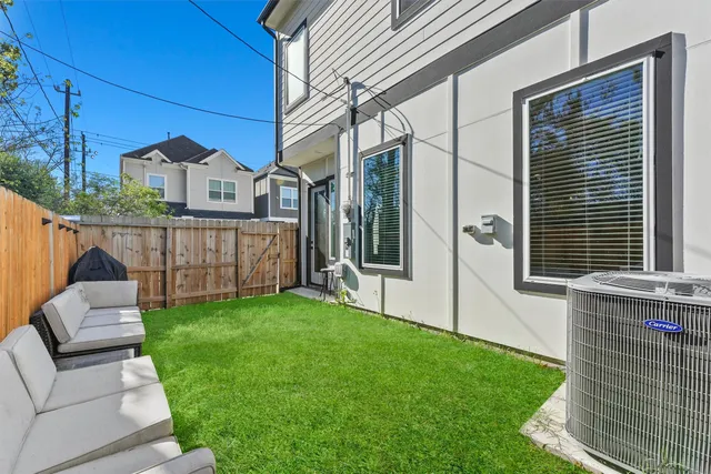 a view of backyard with cabin