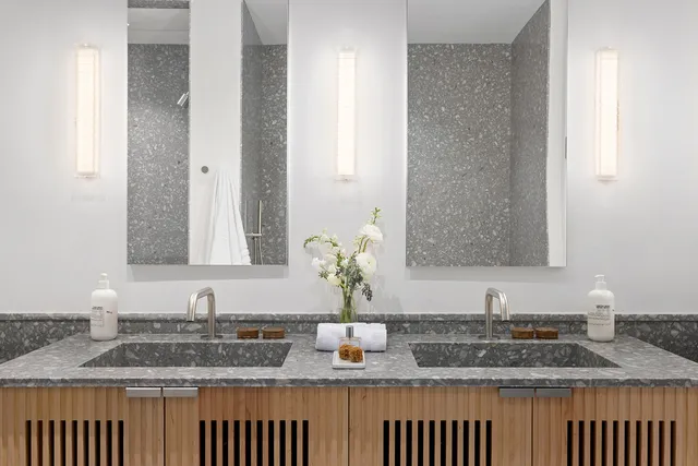 a living room with a large window and a table