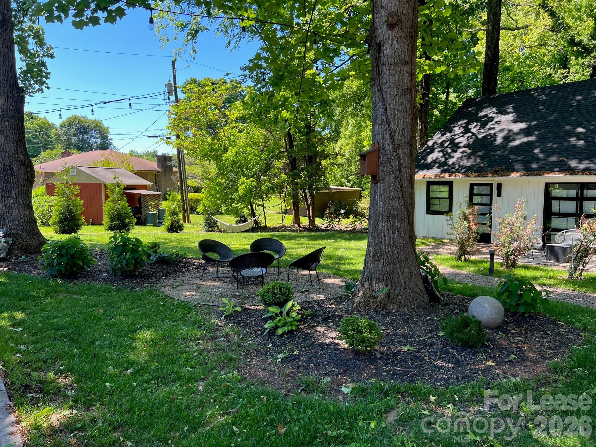 3945 Rockfern Road, Unit B Charlotte, NC 28217 - Photo 45 of 45 a view of backyard with garden and patio