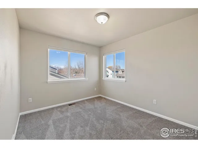 a view of an empty room with window