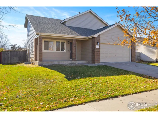 a view of house with swimming pool