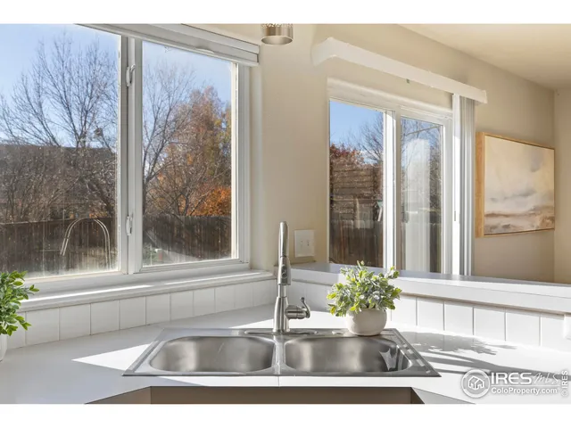 a black and white photo of a living room