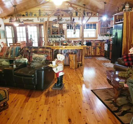 a living room with lots of furniture and appliances