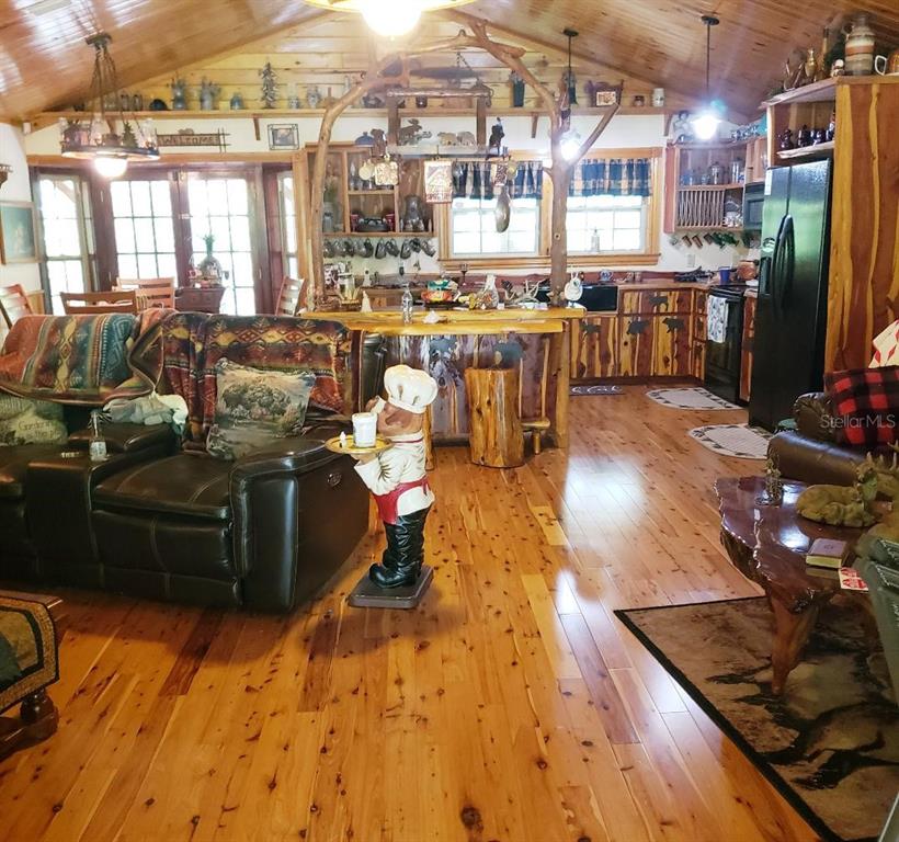 28063 31st Road Branford, FL 32008 - Photo 3 of 29 a living room with lots of furniture and appliances