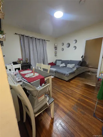 a room with furniture and musical instruments