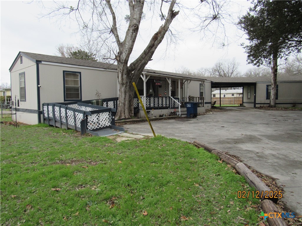 1650 Terminal Loop Road McQueeney, TX 78123 - Photo 1 of 5 a view of a house with a yard and sitting area