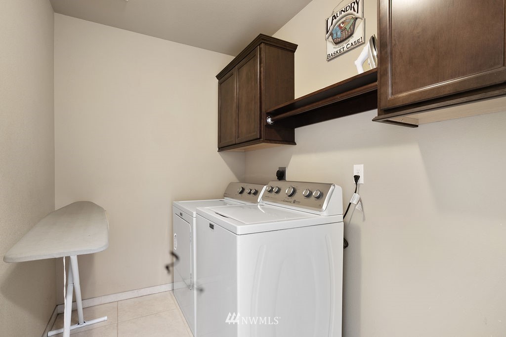 6307 192nd Lane Southwest Rochester, WA 98579 - Photo 22 of 25 a utility room with dryer and washer
