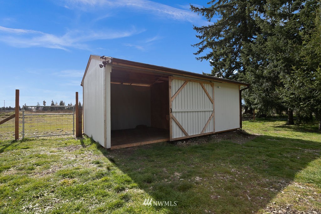 6307 192nd Lane Southwest Rochester, WA 98579 - Photo 6 of 25 a view of a backyard