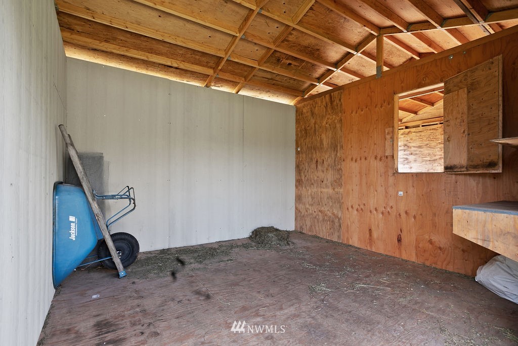 6307 192nd Lane Southwest Rochester, WA 98579 - Photo 8 of 25 a room with gym equipment and a window