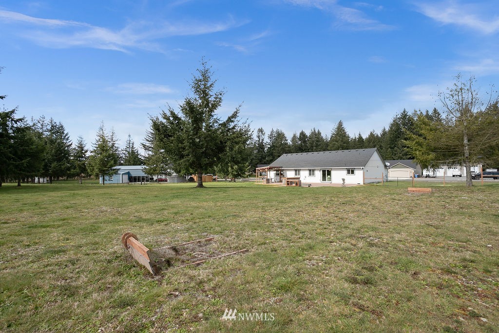 6307 192nd Lane Southwest Rochester, WA 98579 - Photo 9 of 25 a view of a lake with a yard