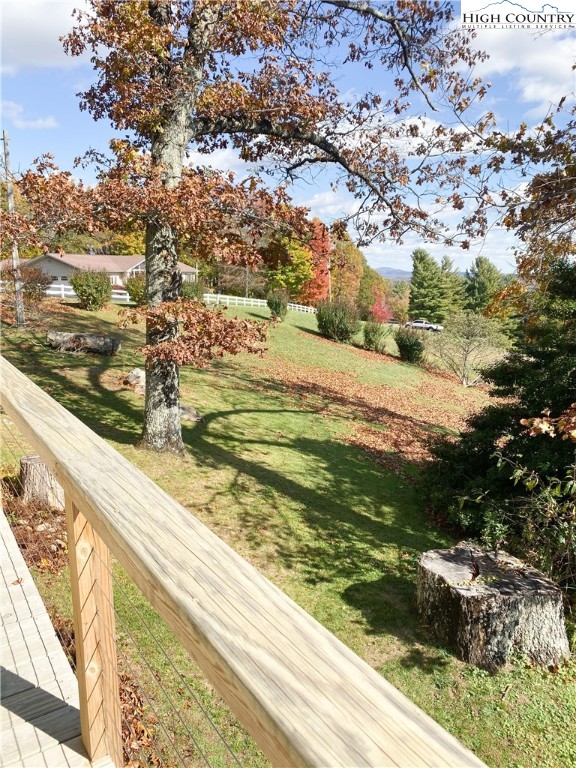 488 Hickory Mountain Road Sparta, NC 28675 - Photo 29 of 41 a view of a yard from a balcony