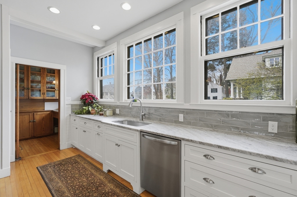 372 Main Street Amesbury, MA 01913 - Photo 12 of 42 a kitchen with a sink and a window