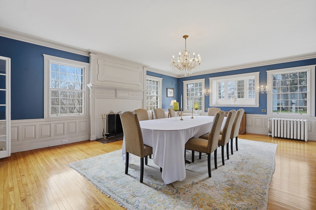 372 Main Street Amesbury, MA 01913 - Photo 17 of 42 a view of a dining room with furniture window and wooden floor