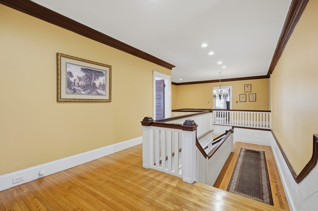 372 Main Street Amesbury, MA 01913 - Photo 23 of 42 a view of a livingroom with furniture wooden floor and windows