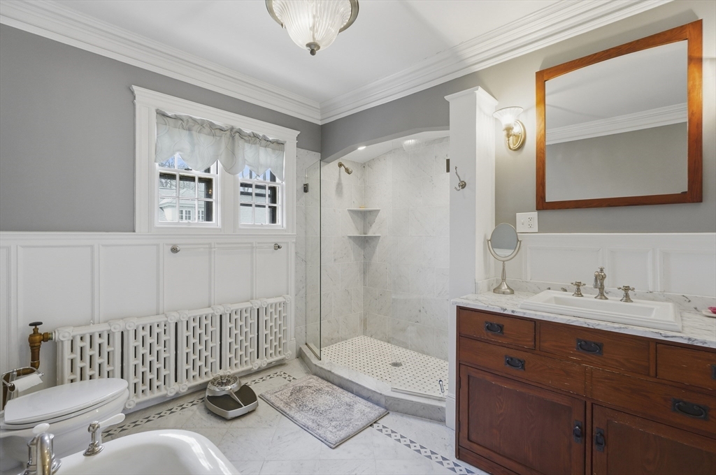 372 Main Street Amesbury, MA 01913 - Photo 27 of 42 a bathroom with a tub shower sink and mirror