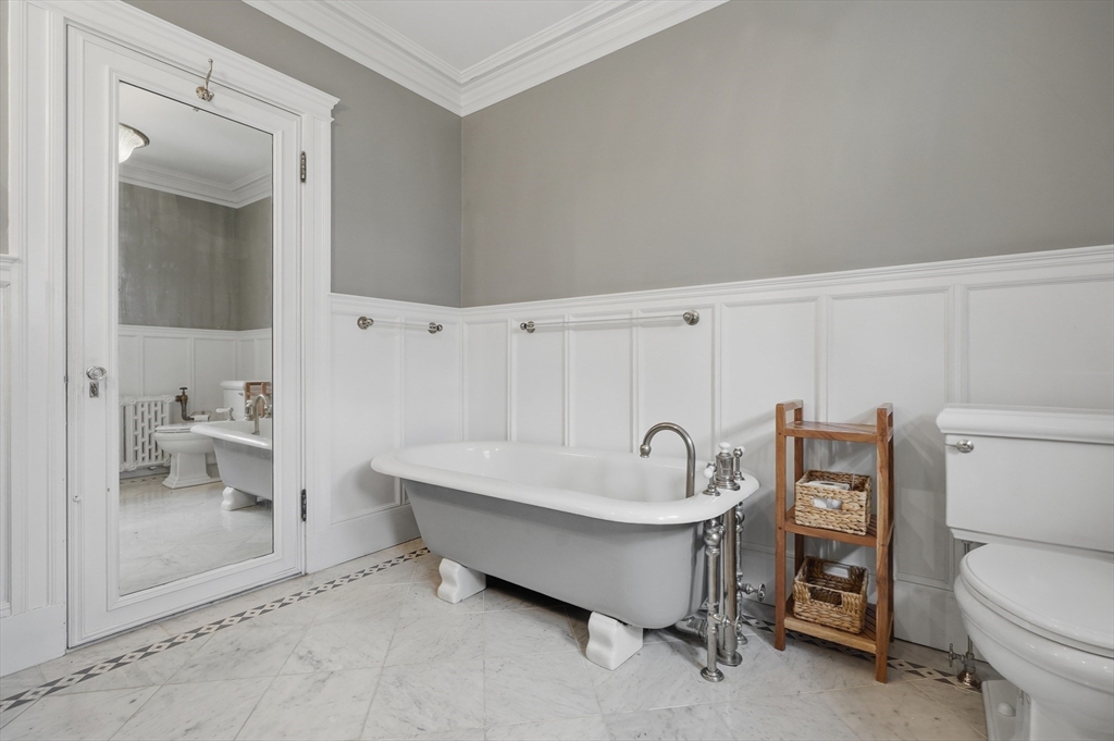 372 Main Street Amesbury, MA 01913 - Photo 28 of 42 a bathroom with a sink and a mirror