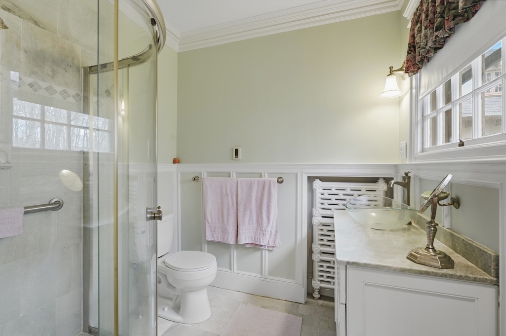 372 Main Street Amesbury, MA 01913 - Photo 32 of 42 a bathroom with a sink a toilet and shower