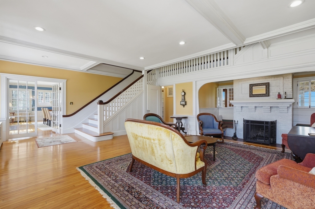 372 Main Street Amesbury, MA 01913 - Photo 5 of 42 a living room with furniture and a fireplace