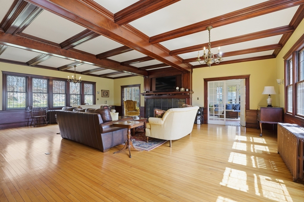 372 Main Street Amesbury, MA 01913 - Photo 8 of 42 a living room with furniture and a wooden floor