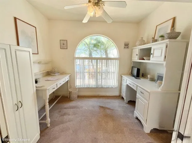 a bathroom with a sink a toilet a mirror a bathtub and shower