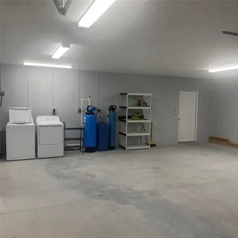a view of a room with furniture and garage