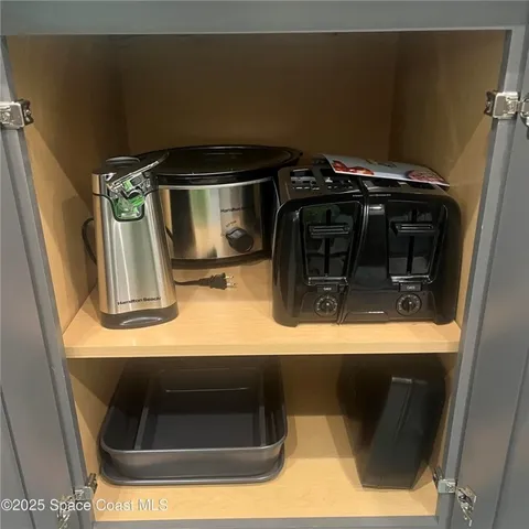 a room with a chair and a table