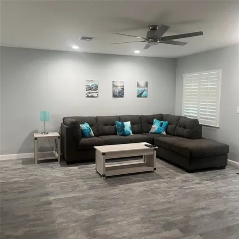 a living room with furniture and a couch