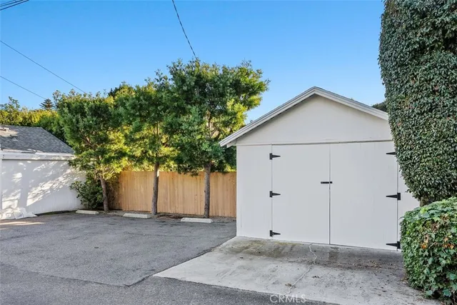 a view of a house with a yard and garage