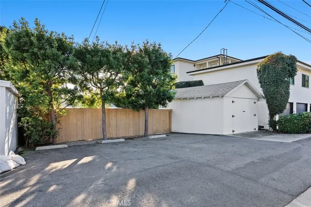 a view of a house with a yard and garage