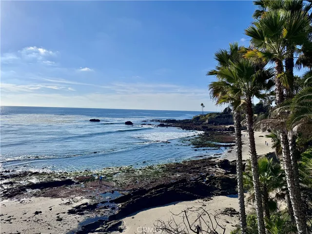 a view of a road with an ocean
