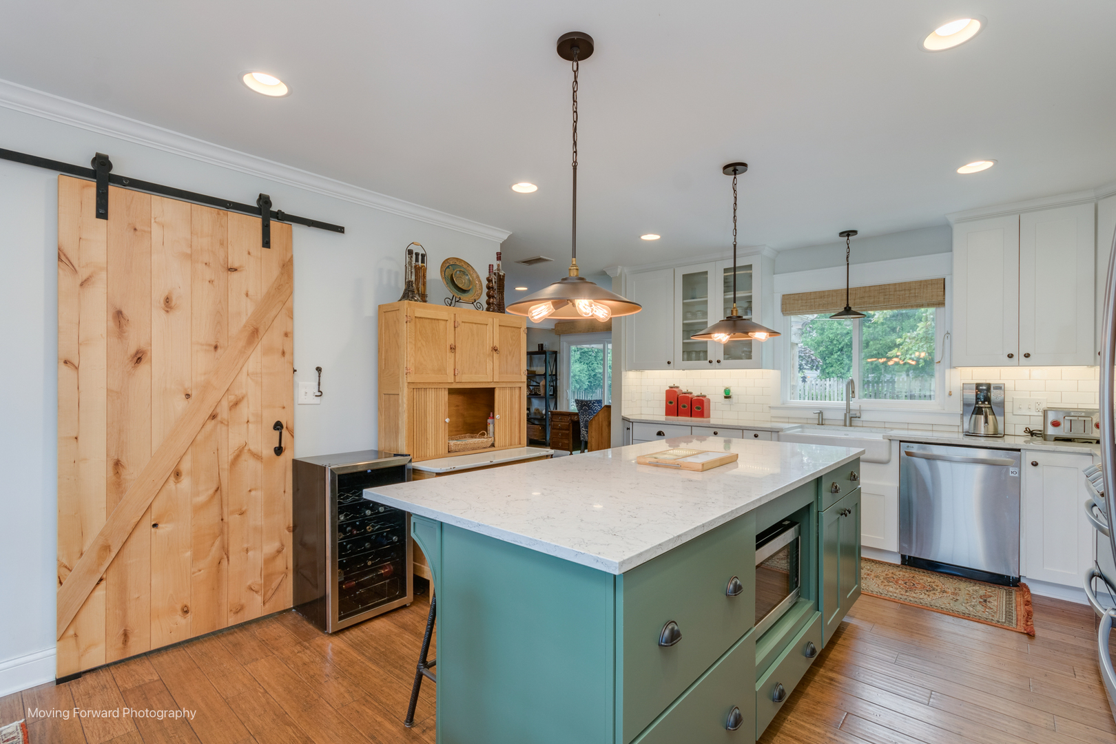 1845 Howard Street Wheaton, IL 60187 - Photo 11 of 41 a kitchen with stainless steel appliances granite countertop a sink a stove a refrigerator and island with wooden floor