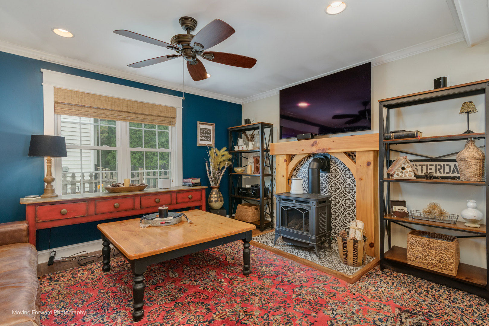 1845 Howard Street Wheaton, IL 60187 - Photo 20 of 41 a living room with furniture a flat screen tv and a fireplace