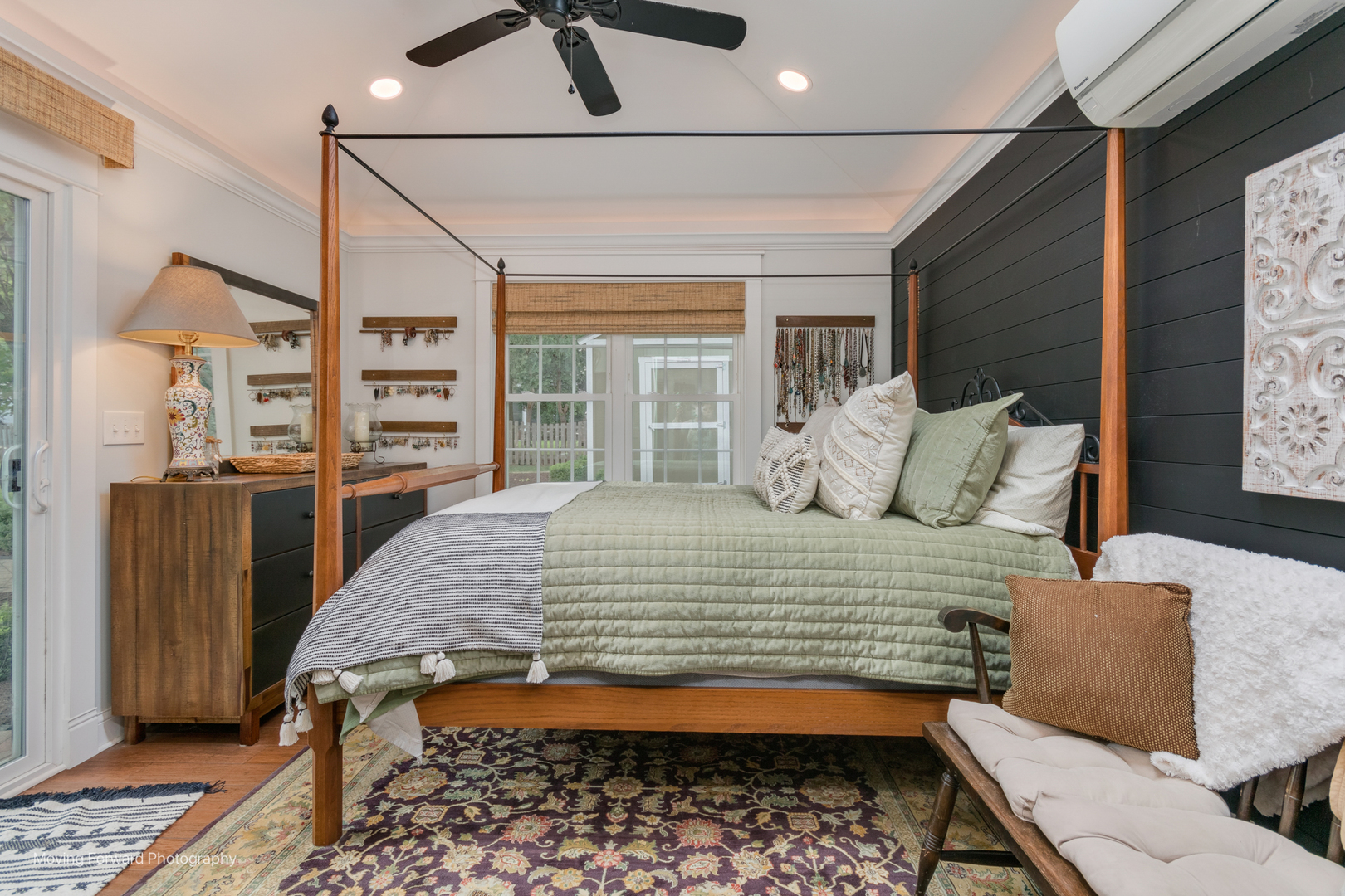 1845 Howard Street Wheaton, IL 60187 - Photo 28 of 41 a bedroom with a bed a couch and potted plant