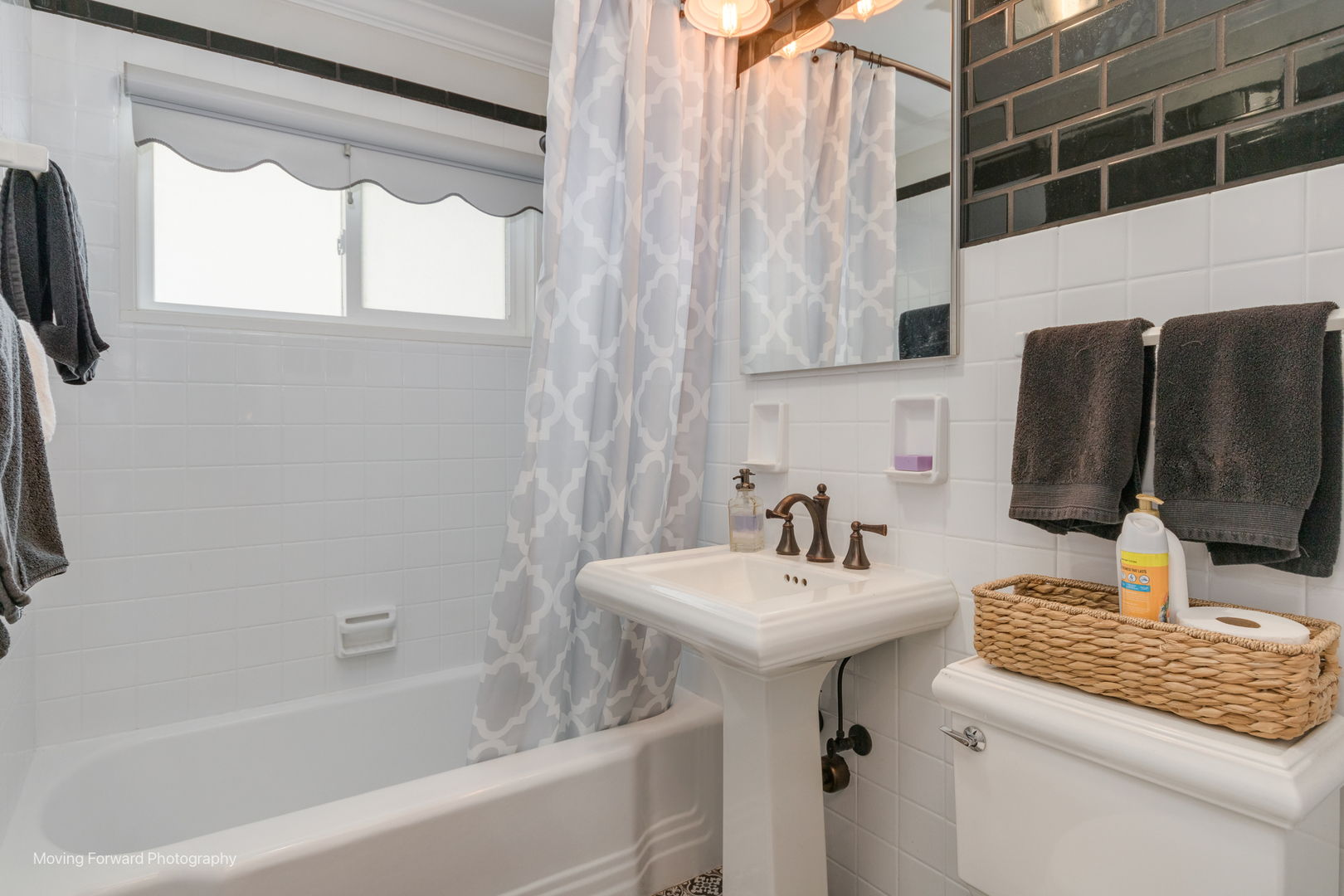 1845 Howard Street Wheaton, IL 60187 - Photo 34 of 41 a bathroom with a sink toilet and tub