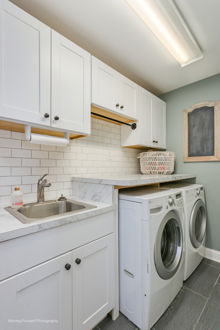 1845 Howard Street Wheaton, IL 60187 - Photo 38 of 41 a kitchen with white cabinets sink and washer