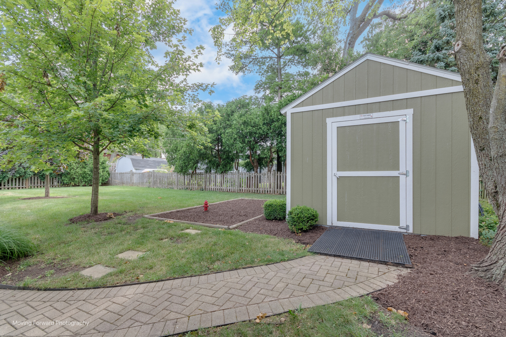 1845 Howard Street Wheaton, IL 60187 - Photo 39 of 41 a view of a house with a yard