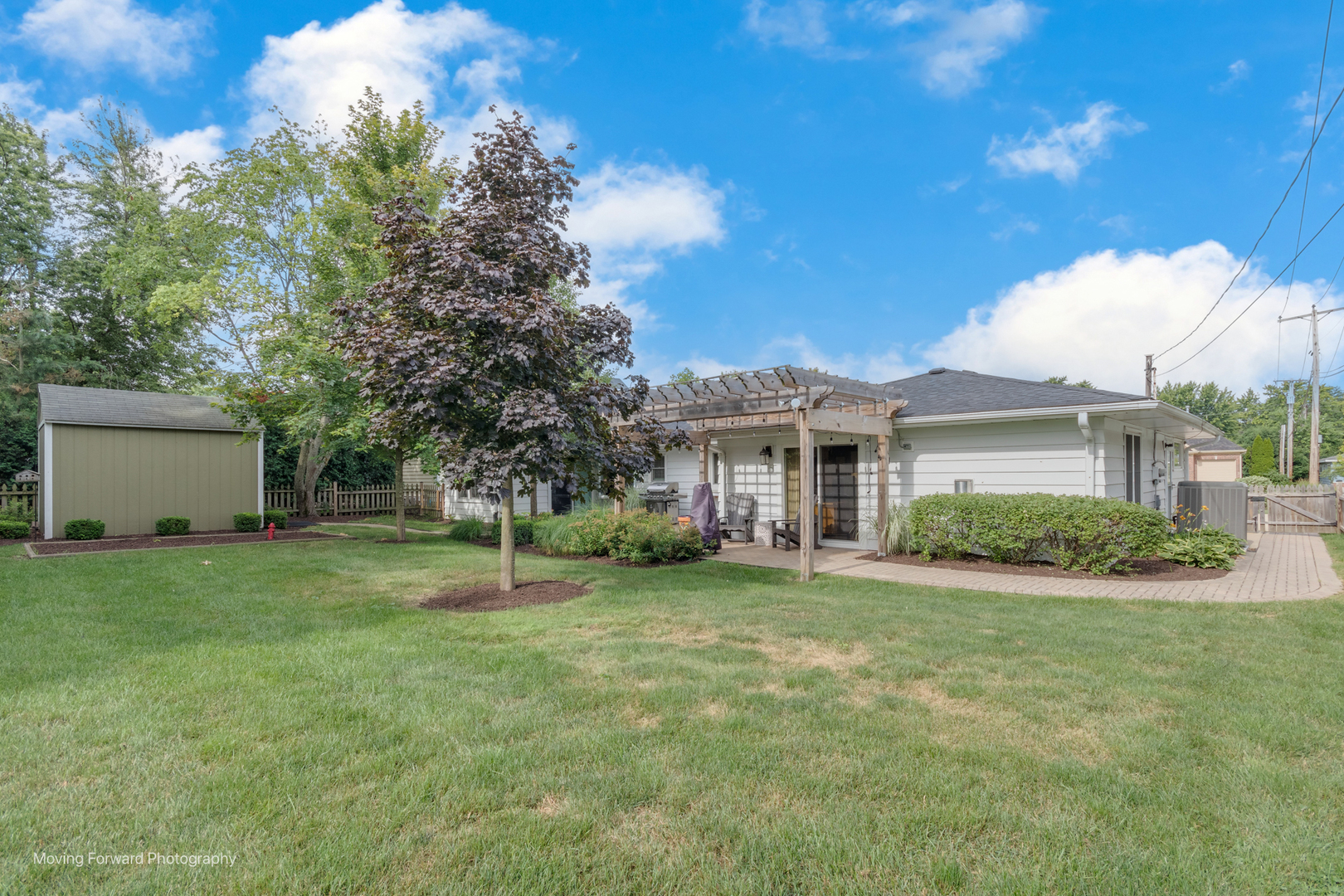 1845 Howard Street Wheaton, IL 60187 - Photo 40 of 41 a house with green field in front of it