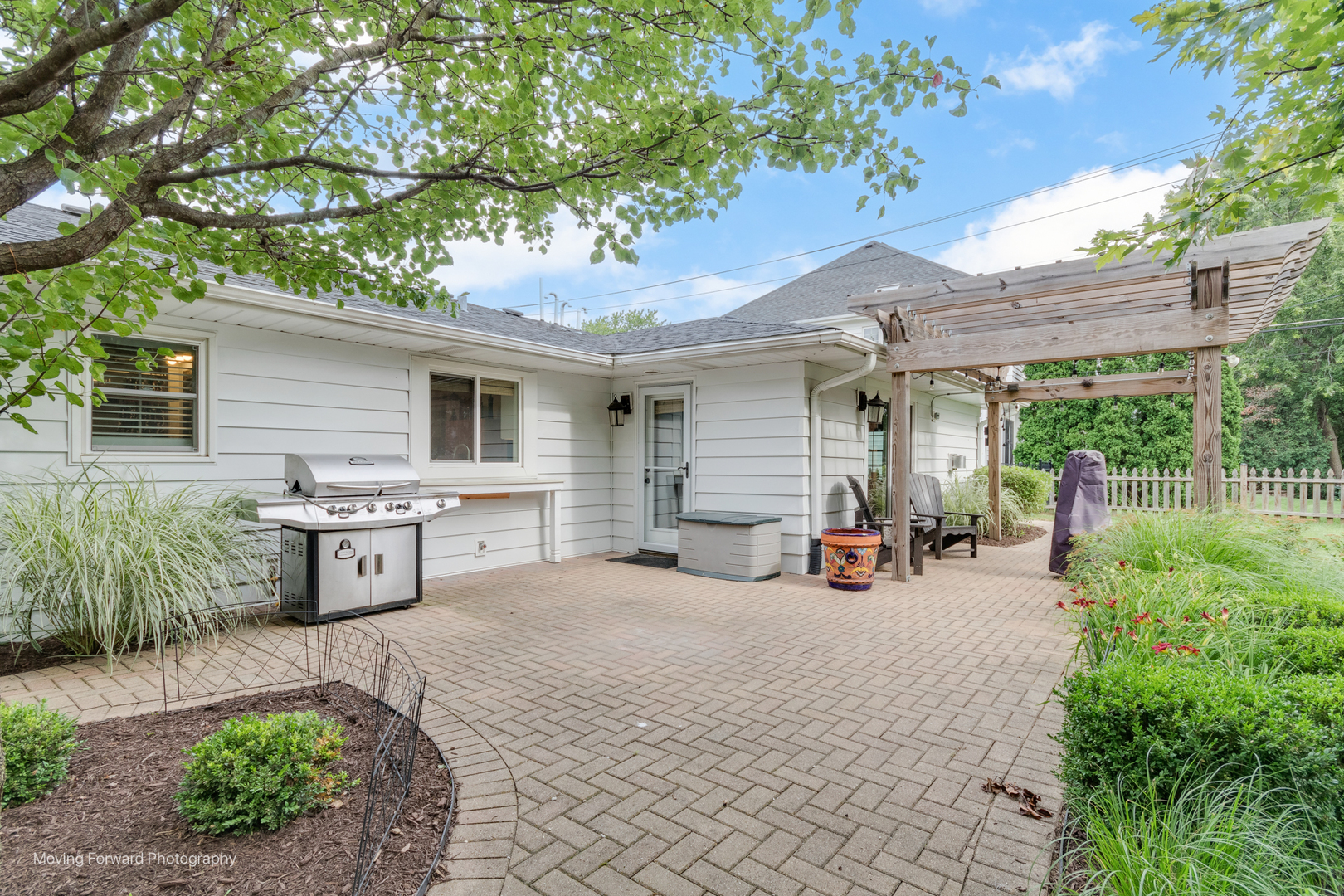 1845 Howard Street Wheaton, IL 60187 - Photo 4 of 41 a view of a backyard with a patio