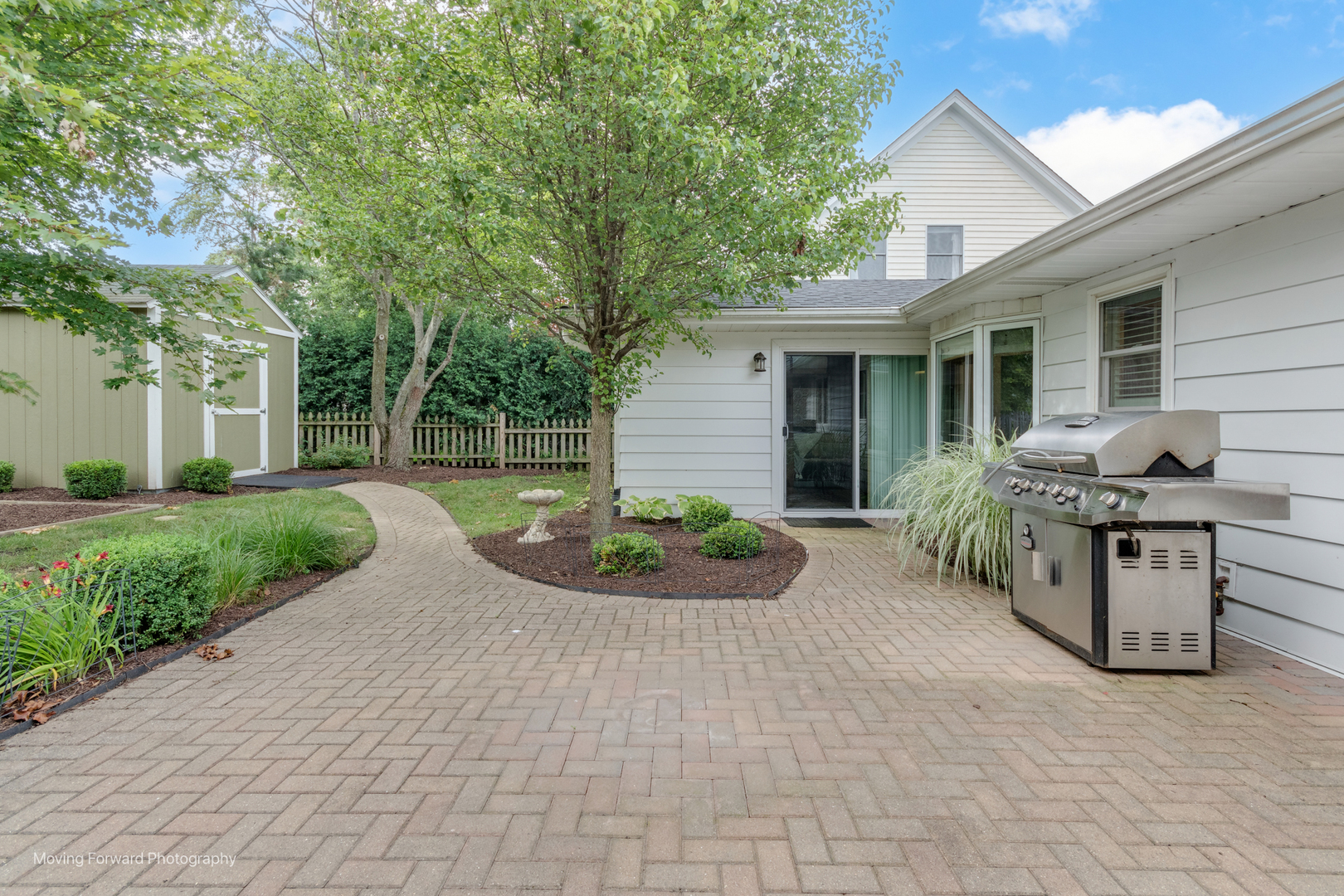 1845 Howard Street Wheaton, IL 60187 - Photo 5 of 41 a view of a house with backyard and sitting area