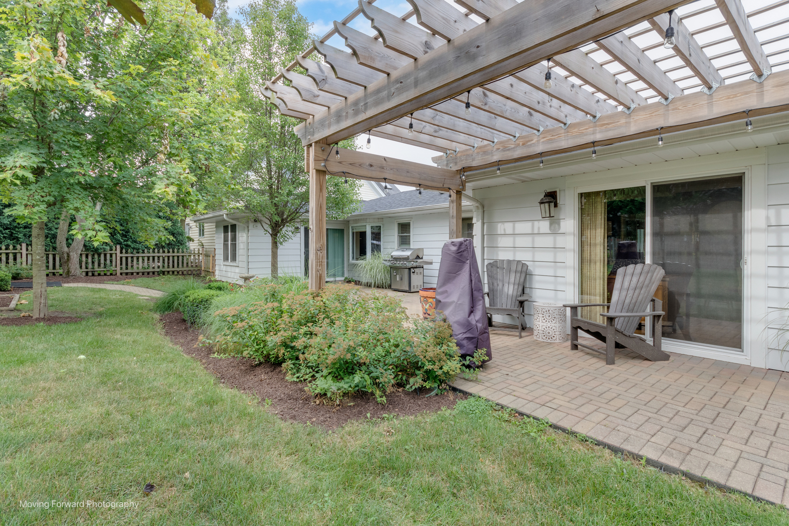 1845 Howard Street Wheaton, IL 60187 - Photo 6 of 41 a front view of a house with patio