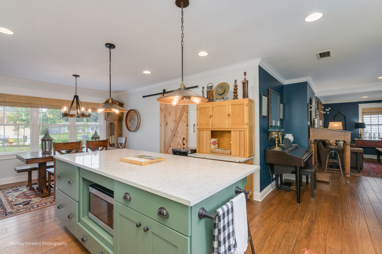 1845 Howard Street Wheaton, IL 60187 - Photo 10 of 41 a kitchen with a stove a refrigerator a oven a dining table and chairs with wooden floor