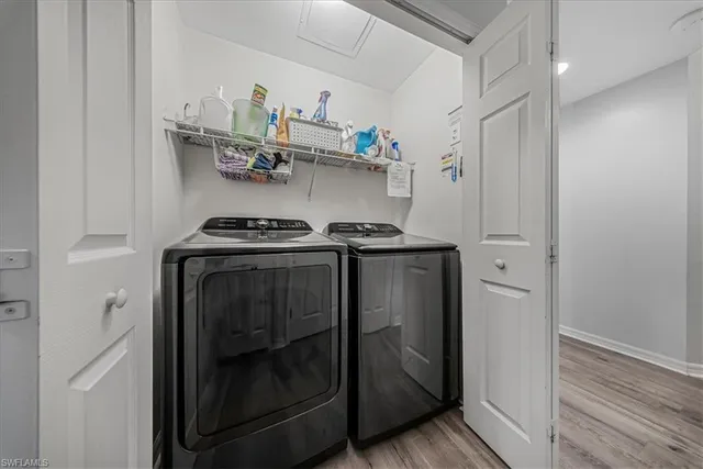 a bedroom with a bed and a book shelf