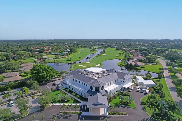 an aerial view of a house with a garden