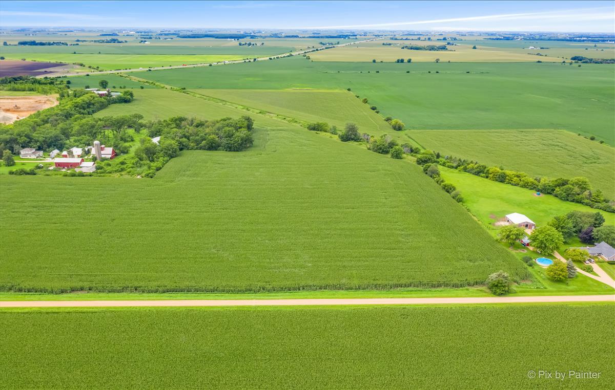 Lot 7 Rowe Road Elburn, IL 60119 - Photo 2 of 23 a view of a field with an ocean